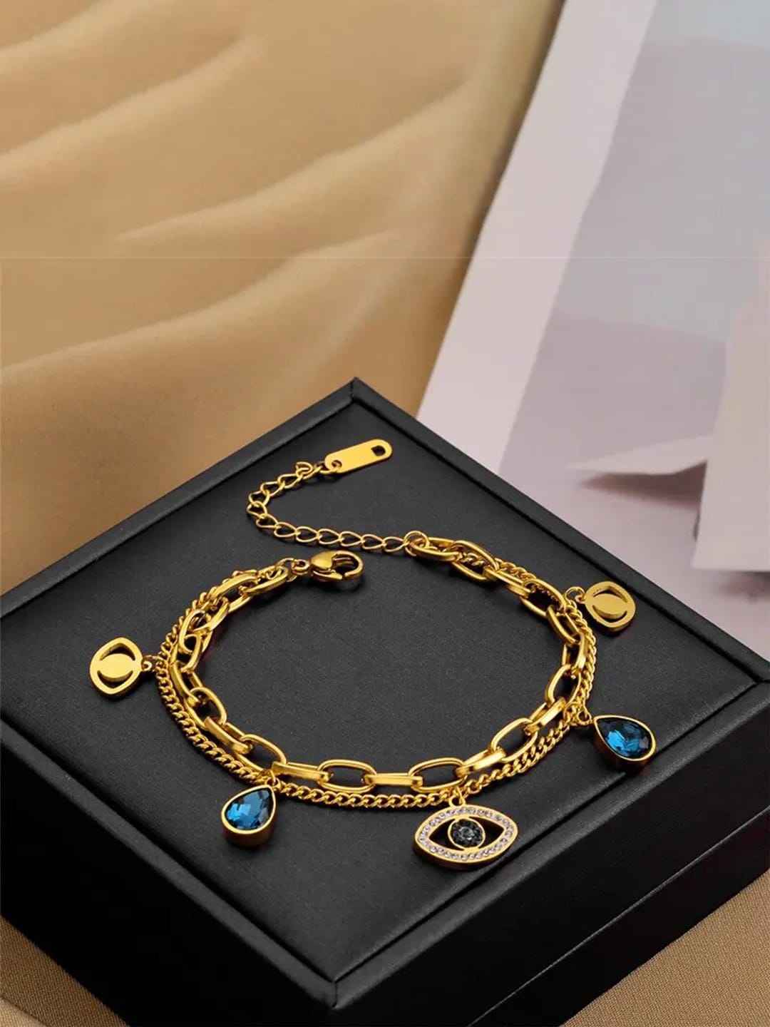 EVIL CHARMS CHAIN BRACELET